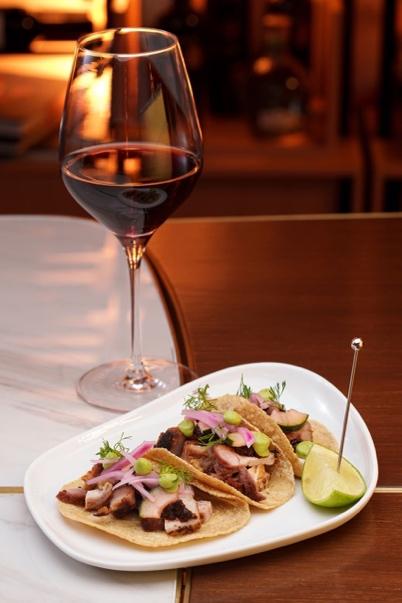 Picture of a glass of wine and a plate